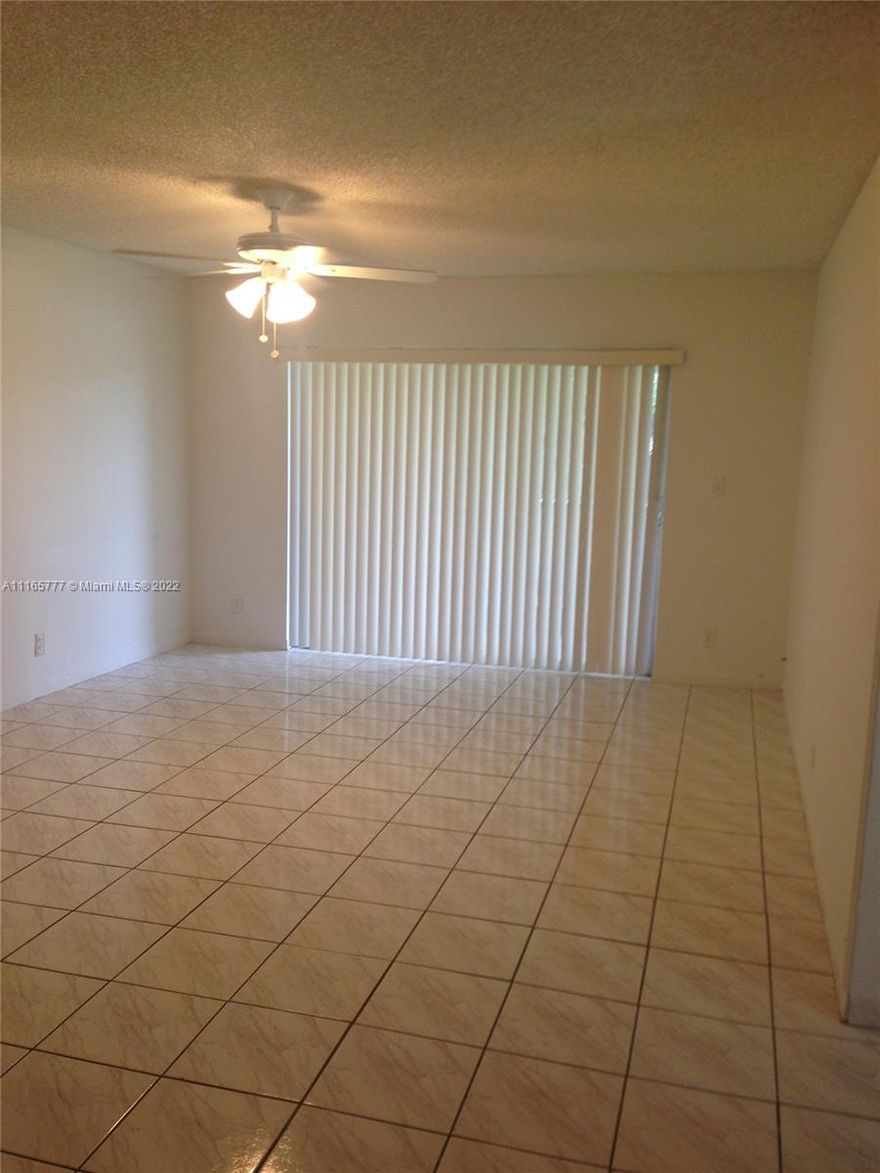 Perfect location in Coral Springs, close to main roads. Spacious 2 bedroom unit and 1 bathroom. Tile throughout and Laminated flooring on bedroom. NO age restrictions. A Schools. Washer and dryer in unit. ASSIGNED Parking Space and plenty of Guest Parking. Community has Pools, Fitness Center, Game room, Sauna, Jacuzzi, Steam room.