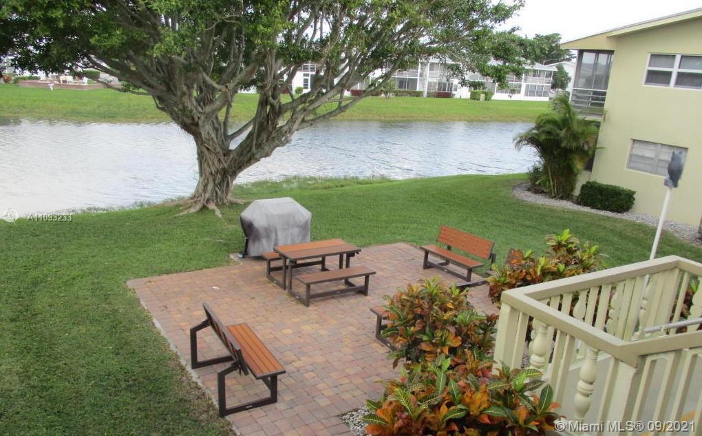 YOU WILL LOVE THIS BEAUTIFUL UPDATED CORNER UNIT IN THIS 55+ COMMUNITY!!! A MUST SEE UNIT: IT FEATURES 1 BEDROOM/1 BATHROOM AN EXTRA HALF BATHROOM, TILE FLOORING, AND A LARGE ENCLOSED BALCONY! UNIT IS LOCATED ON THE SECOND FLOOR, NEXT TO THE LAKE WITH A COURTYARD AND PICNIC TABLES LOCATED JUST ON THE FIRST FLOOR. 24 HOUR GATED COMMUNITY WITH LOTS OF ACTIVITIES AND A COMMUNITY BUS. CLOSE TO MAJOR HIGHWAYS, SHOPS, RESTAURANTS, BEACHES, AIRPORT, AND MUCH MORE!!! SCHEDULE A TOUR AND BRING YOUR BEST OFFER!