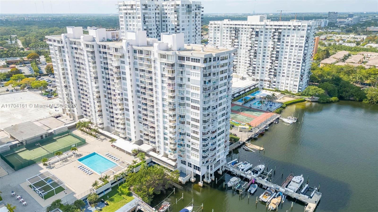 REDUCED FOR QUICK SALE! PRIME LOCATION in AVENTURA. This beautifully renovated 2-bed, 2-bath, corner unit, offers great comfort, elegance, tons of natural light, and breathtaking views! The main living area boasts gorgeous porcelain flooring, setting the tone of modern lifestyle. The newly remodeled kitchen features quartz countertops and an open-concept design connecting easily to the spacious dining/living room areas—bamboo flooring in both bedrooms. Master suite offers a custom-built closet, a newly remodeled bathroom, and a balcony. Guest bathroom also remodeled. Unit has 2 balconies, to enjoy gorgeous city and intercoastal views. Great amenities: 24hrs. Security, 2 pools, tennis courts, gym, sauna, +more. Close to the airport, fine dining, shopping, Gulfstream Park. BRING ALL OFFERS!