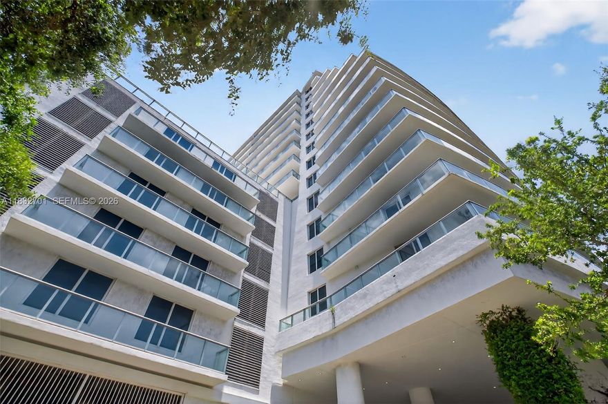 Modern furnished studio with in-unit washer/dryer, assigned parking, and a private balcony offering stunning bay and Morningside views. Currently rented at $2,300/month until December to an excellent tenant—perfect for investors. Full-service building with 24/7 security, pool, gym, party room, rooftop with BBQ area and two jacuzzis, plus guest parking. Ideally located just minutes from Midtown, Design District, Publix, Whole Foods, cafes, and restaurants. Quick access to I-95 and I-195—only 7 mins to Miami Beach and 10 mins to MIA airport. A smart investment and a stylish future home!