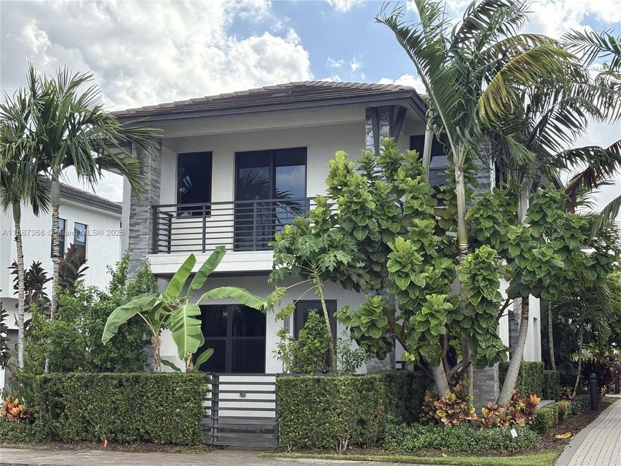 Stunning Canaria Spec home Ibiza Model in Downtown Doral.   Gourmet kitchen with top appliances, and each room with full bath. In front of the incredible resort style clubhouse, pool, full basketball court under a/c, 2 story gym, meeting room, billard room, games room and child play area.  Excellent schools and walking distance to restaurants and shopping. Easy access to I826 and minutes to Miami International Airport.
