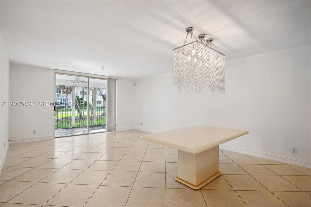 Photo of 619 NE 14th Ave #101, Hallandale Beach, FL 33009 (MLS # A12065594)