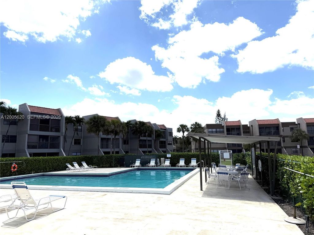 Photo of 230 Lakeview Dr #307, Weston, FL 33326 (MLS # A12005620)