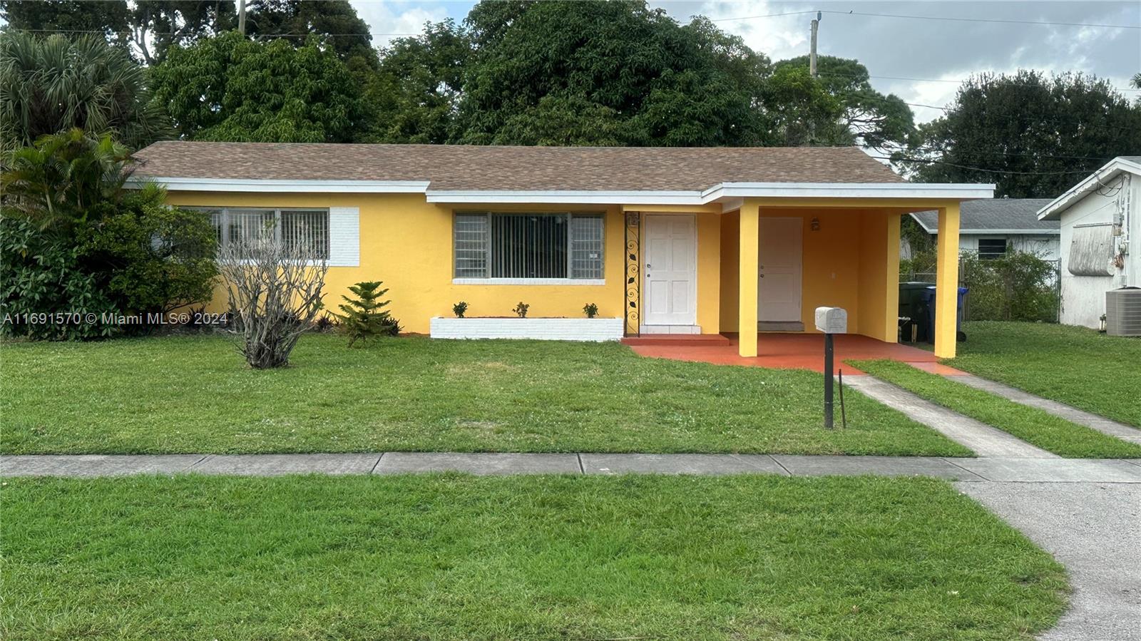BEAUTIFUL UPDATED HOUSE 2 BEDROOM / 1 BATHROOM (BIG MASTER BEDROOM) WITH 1181 SQ. FEET AND LOT 8,751 SQ. FEET LOT, open floor distribution with tile, located IN A GREAT QUIET FAMYLYNEIGHBORHOOD, HOUSE READY TO MOVE IN AND LIVE IN . CENTRAL AC, Aluminum shutters in all windows, NEW ROOF & SOFFIT FASCIA with permit (NOV-24) new kitchen with quartz tops, with stainless steel appliances, updated bathroom, new laminated water proof floor IN BEDROOMS, freshly painted inside and outside. LAUNDRY ROOM WITH WASHER & DRYER. COVERED CARPORT. GREAT INVESTMENT PROPERTY OR GREAT RENTAL PROPERTY WITH BEAUTIFUL LANDSCAPE WITH FRUIT TREES, BACKYARD FENCED IN GREAT LOCATION, YARD BIG ENOUGH FOR BOAT SPACE ANDPLENTY OF DRIVEWAY PARKING, NO HOA FEES, CLOSE TO MAIN AVENUES AND HIGHWAYS AND SHOPPING CENTERS.