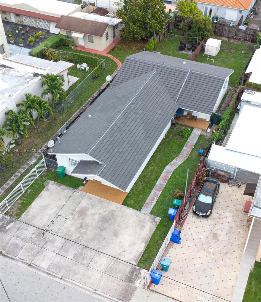 Investor’s dream in a prime Miami location close to the Marlin's Stadium, downtown Miami, Brickell, major highways,  shopping, and more. This 2,393 SF duplex features two spacious 3-bedroom, 2-bath units, which is rare in this area. Each unit comes with its own private entrance, generous living areas, well-sized bedrooms and baths, and separate private yards. Upgrades include a new roof, impact doors, remodeled bathrooms. Property offers separate water and electric meters and plenty of parking spaces. Also features some new appliances. Each unit includes its own washer and dryer. Both units are currently rented under market price.  This is a strong income-producing opportunity.