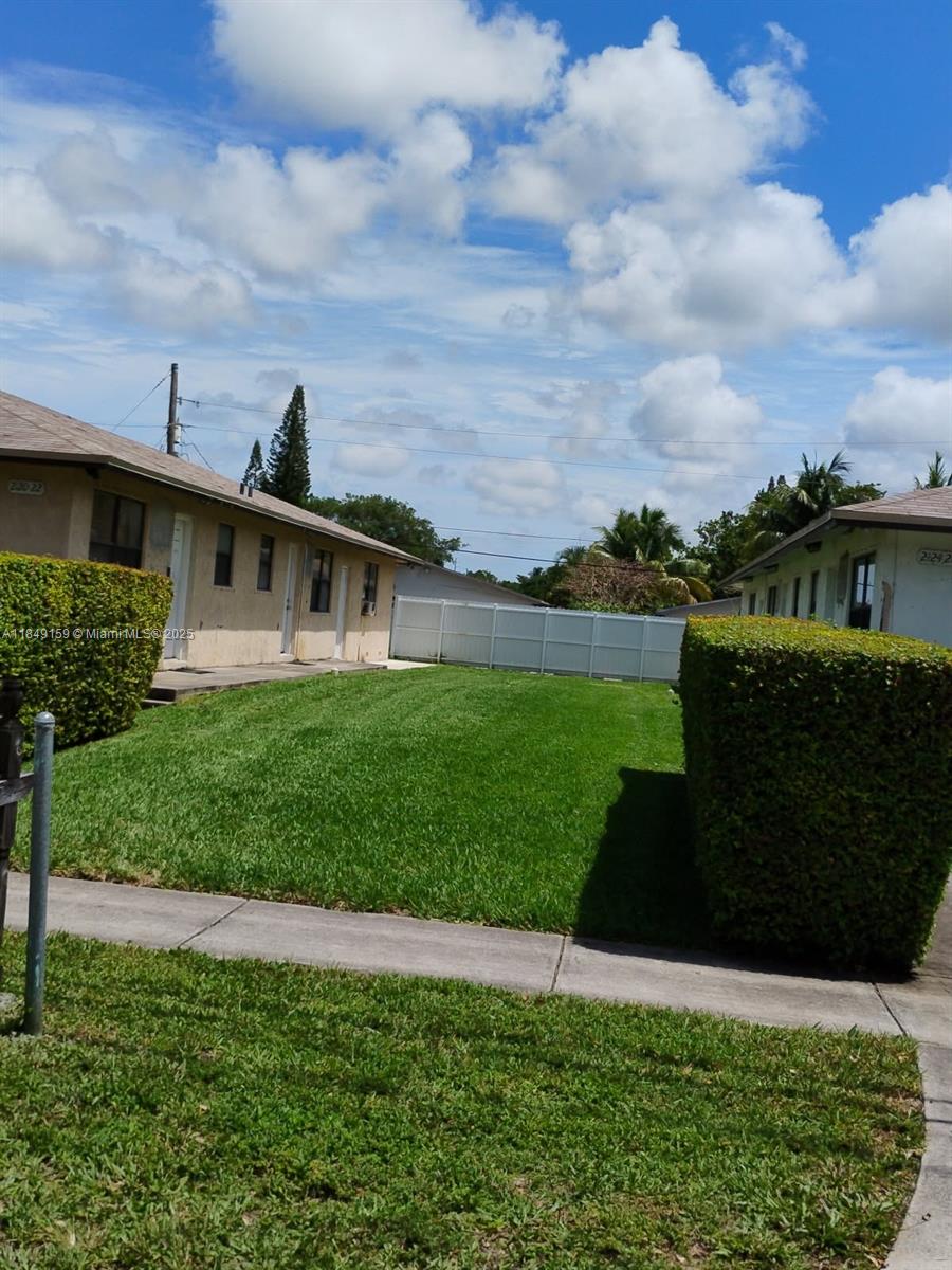 SPACIOUS 1 BEDRM, 1 BATH UNIT IS IN A VERY QUAINT & WELL MAINTAINED DUPLEX WITH LUSH LANDSCAPING & PARKING FOR 2 CARS. THIS FRESHLY PAINTED SPACIOUS UNIT HAS TWO NEW MINI SPLITS AC, NEW REFRIDGERATOR, NEW STOVE & EXHAUST, TILES FLOORS THROUGHOUT, NEW BATHROOM CABINET & NEW WASHER & DRYER. HURRICAN SHUTTERS. TRUE MOVE IN CONDITION. SMALL FENCE IN PRIVATE PATIO IN BACK GREAT FOR A BBQ. MAKE THIS ONE A MUST SEE!! WATER, TRASH & LAWN CARE INCLUDED IN RENT.
