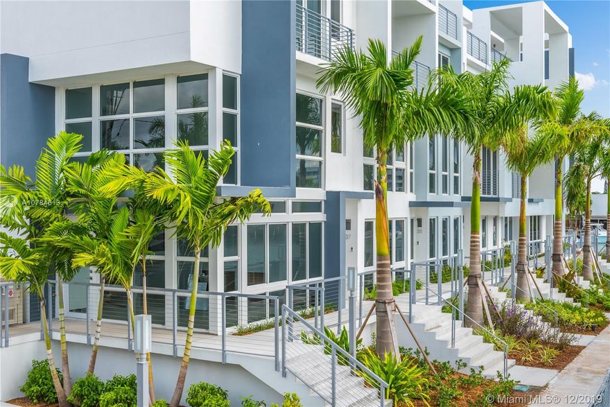 **BRAND NEW*** This 3 BD/3.5BA Townhome is in a private waterfront gated community, next to the Normandy Golf Course, tennis and basketball courts, cool restaurants, and a short bike ride to the beach. Luxury features include designer finishes, private elevator, and private rooftop terrace with beautiful views of the city. Everything you've been looking for including 2 car garage, waterfront pool, and lush landscaping, all for a shockingly low HOA fee of $303/month. North Beach is the hottest emerging neighborhood on the beach - don't miss out on your chance to get in now!