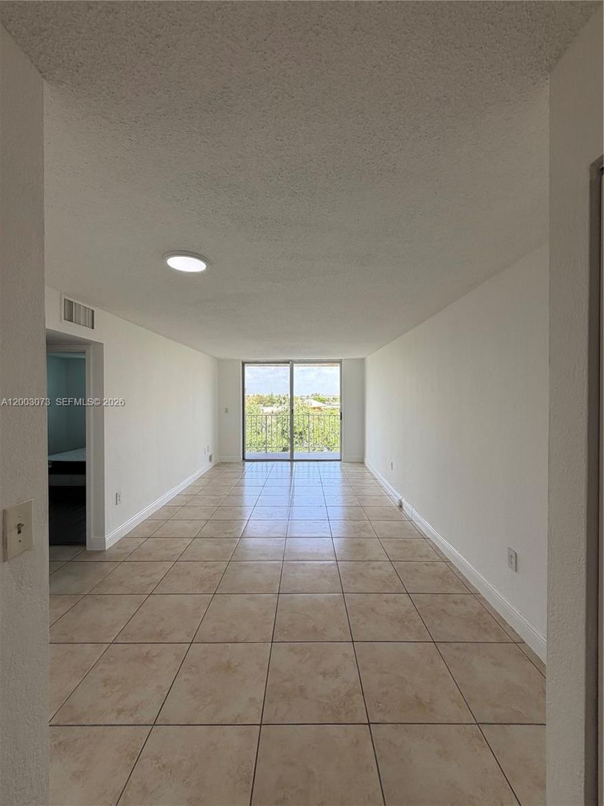 This spacious and inviting 1-bedroom, 1.5-bath residence in a well-maintained North Miami building. Filled with natural light, the unit offers a private balcony perfect for relaxing, assigned parking, and access to wonderful community amenities including a pool. Washer and dryer conveniently located in the building. Ideally situated just minutes from Bal Harbour, the beaches, Aventura, and major highways, offering both comfort and convenience. Whether you are looking for a place to call home or a smart investment opportunity, this property offers warmth, charm, and excellent potential in a growing area.