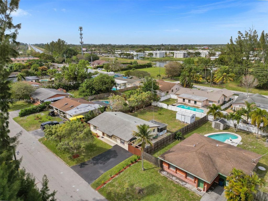 Photo of 5501 NW 76th Pl, Pompano Beach, FL 33073 (MLS # A11542520)