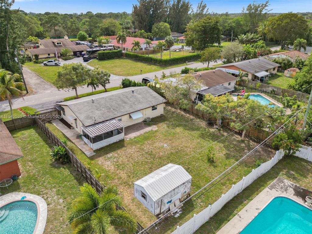 Photo of 5501 NW 76th Pl, Pompano Beach, FL 33073 (MLS # A11542520)