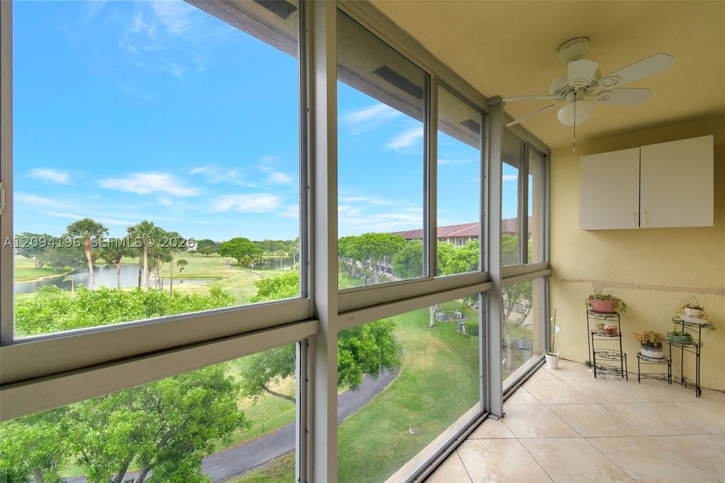 Photo of 13475 SW 9th St #413A, Pembroke Pines, FL 33027 (MLS # A12094196)