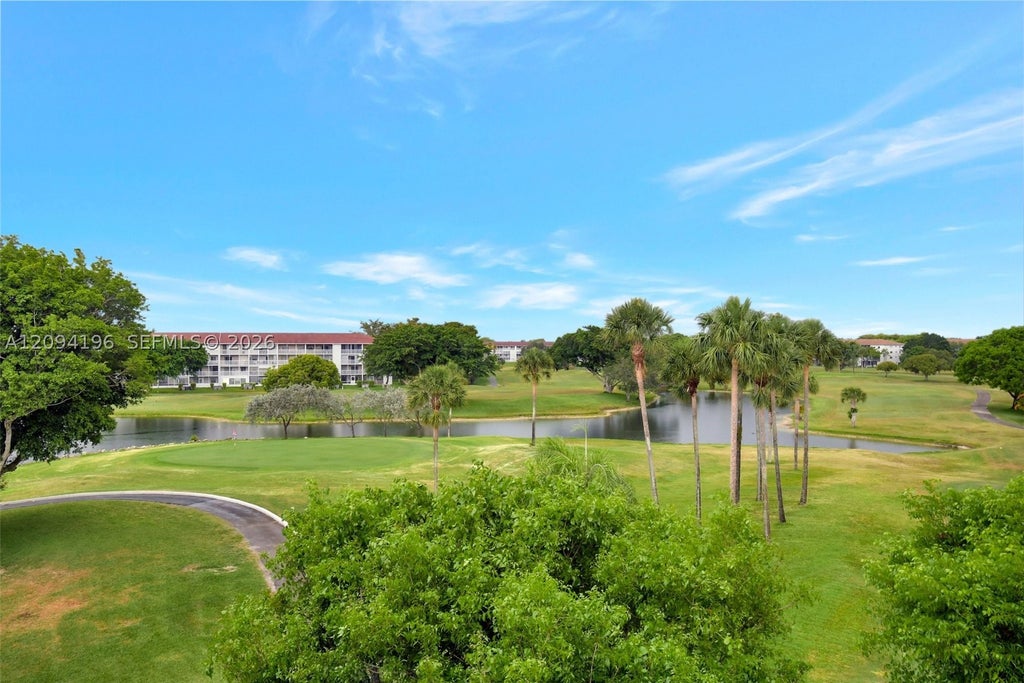 Photo of 13475 SW 9th St #413A, Pembroke Pines, FL 33027 (MLS # A12094196)