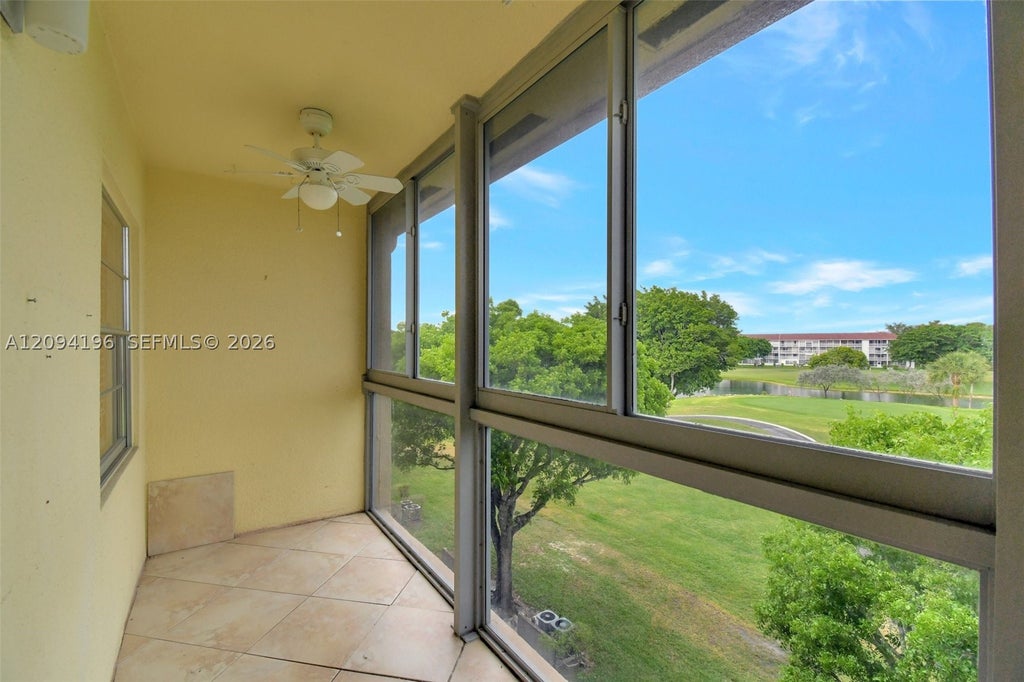 Photo of 13475 SW 9th St #413A, Pembroke Pines, FL 33027 (MLS # A12094196)