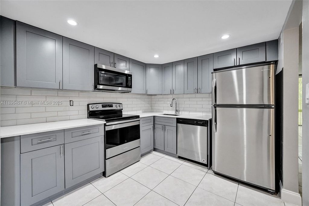 Photo of 8401 W Sample Rd #20, Coral Springs, FL 33065 (MLS # A11896457)