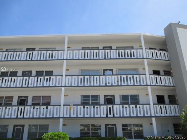 2 bed 2 bath 2nd floor unit in Century Village. Nice lake view from enclosed patio. Great opportunity.