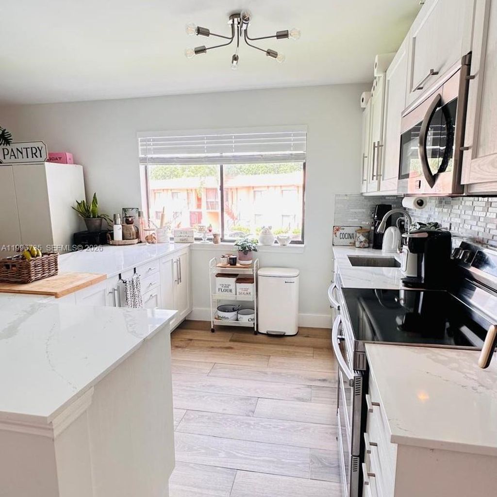 Photo of 223 Lakeview Dr #204, Weston, FL 33326 (MLS # A11996735)