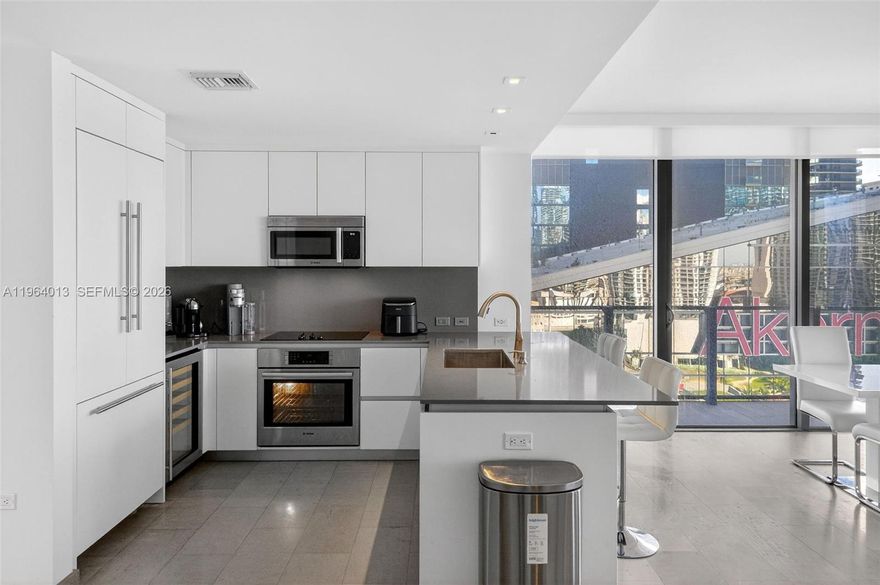 Beautiful 2 bed 2.5 bath corner unit with wide wraparound balcony right on top of Brickell City Centre. Enjoy the walkable urban neighborhood with fine dining,bars,fashionable retail shops,supermarkets like WholeFoods|Publix,outdoor Mary Brickell Village mall,bus|free Metromover stations,and so much more. Just a ride away from the airport,Miami Worldcenter,Wynwood|Design District,and Miami Beach. This exclusive 1,265sq.ft. condo unit comes with marble floors,Italian cabinetry,quartz kitchen countertop,wine cooler, stainless steel appliances,washer & dryer,double sinks and separate shower|large bathtub in the primary bathroom & walk-in shower in the 2nd bathroom,custom walk-in closets,sheer window blinds throughout the unit plus blackouts in the bedrooms.Furniture optional incl.three 75" Insignia Smart Amazon Fire TVs+Alexa voice remote & Purple3 queen mattress bed.Maintenance fee incl.TV cable,Internet,garage parking spot(extras avail.) & all amenities that Reach has to offer. Relax at the heated infinity|lap pools,2 oversized hot tubs,private spa facility: treatment room|infrared sauna|Hammam,lounge,party|billiard room,garden BBQ area,large 24/7 fitness center w/ studio,unique kids indoor playroom & outdoor playground,24/7 business center|conference room,front desk concierge service,24 hrs. security,EV charging stations,bicycle storage,and valet parking.No short-term rentals. 2pets max.50lb.Live a private high-end residential lifestyle in the center of Miami! Offers Welcome!