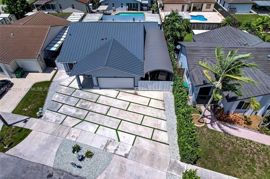 A beautiful and comfortable home featuring a saltwater pool and two kitchens—one inside the house and another outdoors—both fully equipped with their respective appliances. The property includes a patio lounge area, parking space for approximately six cars, plus an additional spot for boat storage. For enhanced security, the home is enclosed by an aluminum fence and features impact-resistant windows and doors. The bedrooms are generously sized, and the location is highly central within Southwest Miami.
The owner is still alive and the property, please call listing agent to show. Available on or before June 15 2026
Do not disturb the owners.