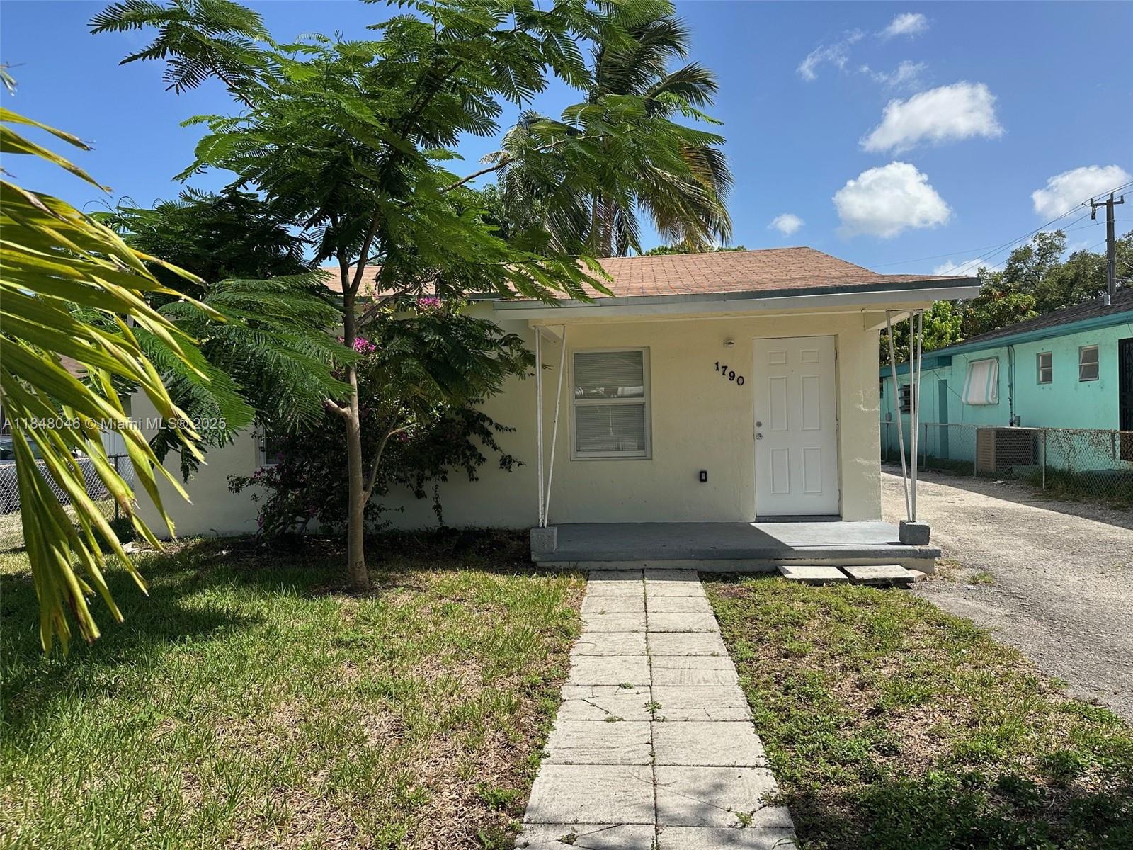 Charming 2-bed, 1-bath home with a brand-new roof, in-unit washer/dryer, and a spacious lot with plenty of open space. Great for entertaining or future expansion. Move-in ready in a central Miami location.