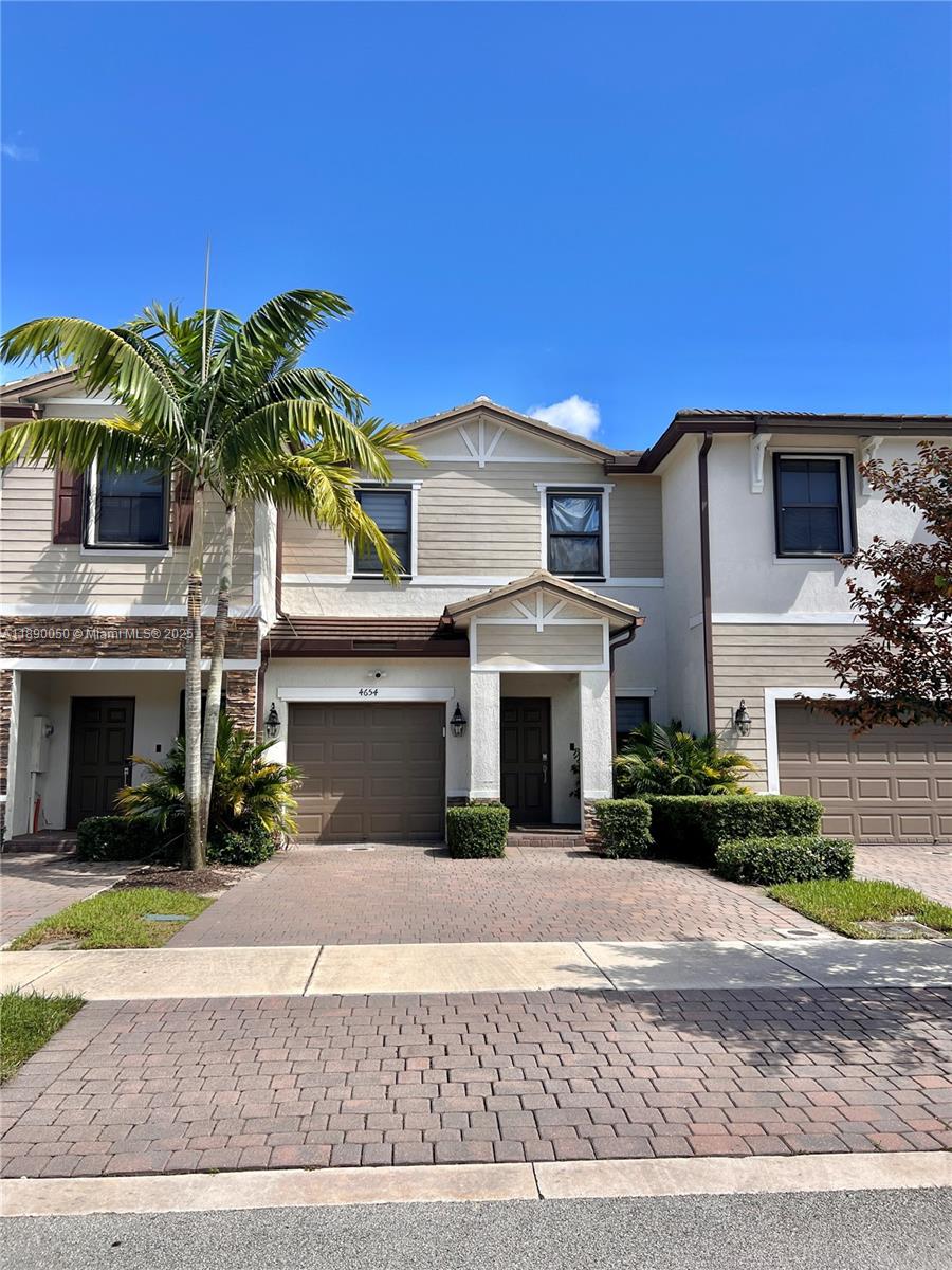 Welcome to this beautiful COMPLETELY REMODELED Townhouse At Palomino Lake! Over $50k In upgrades! Absolutely beautiful 5 years construction Townhouse with 3 Beds, 2.5 baths, 1 car garage. Smart Home equipped with Alexa & Ring Entry and WIFI Access points. Porcelain tile through out the Home, a beautiful kitchen with granite countertops, wine cooler, 2 years old Stain Steel appliances with elegant touches and a pantry. Come & enjoy a fenced patio with artificial grass and Impact windows. Large master bedroom that brings you to a designed large Master bathroom with dual sinks nicely decorated. Just minutes to major highways to make your commute easier. Only 5 minutes to Summit Questa Montessori School. Security camaras included. It is by far the best one in this community & It will not last!