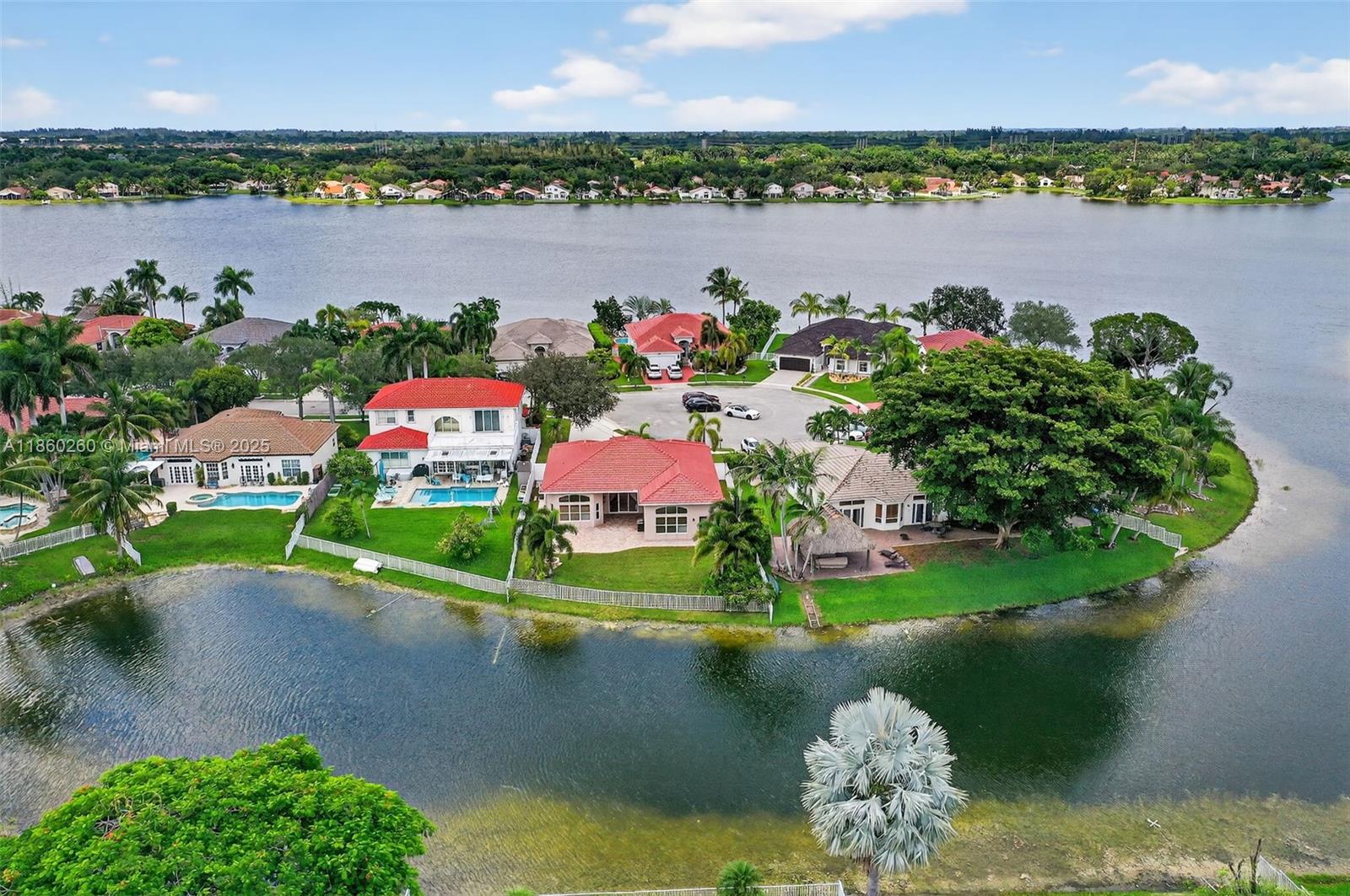 YOUR WAIT IS OVER..... REMODELED 4 Bedroom, 2.5 Bath ***LAKEFRONT - VENICE MODEL HOME*** on a Private Cul-de-Sac in Sought After KEYSTONE LAKE ESTATES at PEMBROKE PINES. Features an Inviting Floor Plan, Renovated Open Kitchen, Espresso Cabinetry, Granite Countertops, Stainless Steel Appliances, ENORMOUS ISLAND/SERVING BAR, Spacious Master Suite, Large Walk-in California Closet, Dual Vanities, Roman Soaking Tub, Generous Guest Rooms, Neutral Tile and Plank Flooring Throughout, Expansive Covered Patio, Fenced Grounds, Oversized Lot, Deep Multi-Car Driveway, Room for a Pool ***TRANQUIL WIDE LAKE VIEWS***. Residents Enjoy Gated Security and Community Tot Lot. Low HOA Includes Cable TV & Internet. Convenient to Shopping, Dining, Entertainment, TOP RATED SCHOOLS and more...