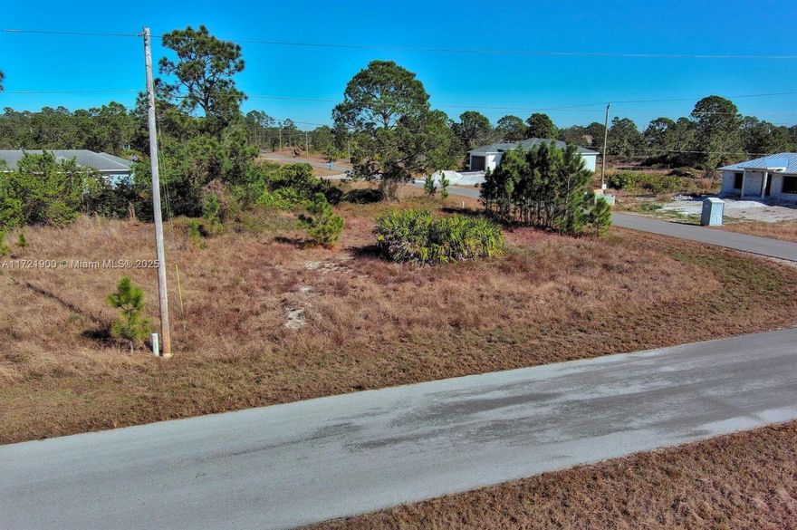 Exclusively offered by Sunland Real Estate: Oversized 0.25-acre residential lot in one of the best location in South Lehigh Acres. Corner lot, cleared, perfectly positioned for your next development. This prime property boasts a high and dry elevation, ensuring it's completely outside flood zones and ideal for building with confidence. Conveniently located near major boulevards, this lot provides direct access to the town center, making it a fantastic choice for those seeking convenience and growth potential. Lehigh Acres is a thriving Southwest Florida community celebrated for its affordable land, welcoming neighborhoods, and excellent location near Fort Myers. Enjoy quick access to shopping, dining, and the breathtaking Gulf Coast beaches.