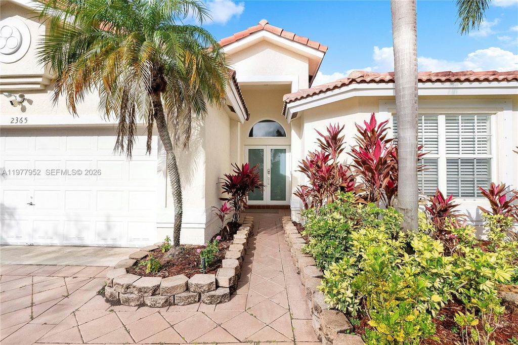 Photo of 2365 NW 137th Ter, Sunrise, FL 33323 (MLS # A11977952)