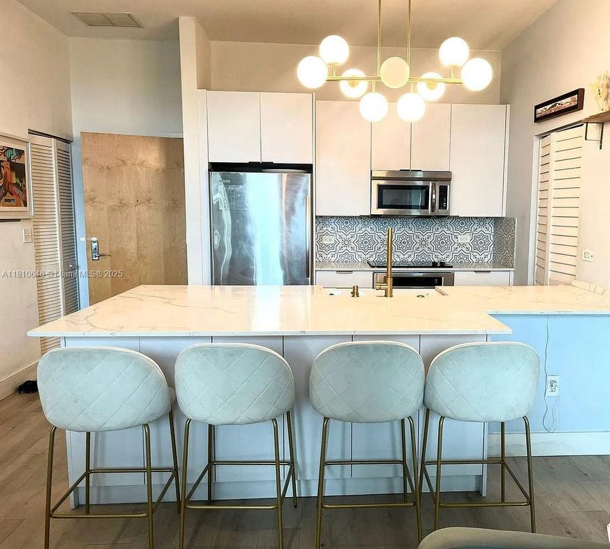 Stunning 2BR/2BA Downtown Miami Apartment with Loft-Style Ceilings & Modern Remodel. Located directly across from Bayside and just steps from premier shopping, dining, Miami Beach, and Brickell City Centre, this is the ultimate in location and lifestyle. Offered unfurnished or furnished to suit your needs, High-speed internet and basic cable included. Same floor Garage