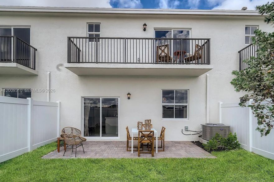 Step inside to find a spacious two-story layout with 1,712 sq ft of living space, impact windows throughout, and a bright, open interior filled with natural light. The modern kitchen is designed for everyday living and entertaining, and the attached garage adds convenience you won't find in every townhouse at this price point.

Cedar at Keys Gate offers a family-friendly community with low HOA fees — a rare find in South Florida. The private backyard gives you room to set up a grill, a play area, or your own outdoor retreat.
Located in Homestead with quick access to the Florida Turnpike, US-1, and Florida City. Minutes from shopping, dining, and top-rated schools in the Homestead area. Close to everything while still feeling like home.

Schedule your private showing today.