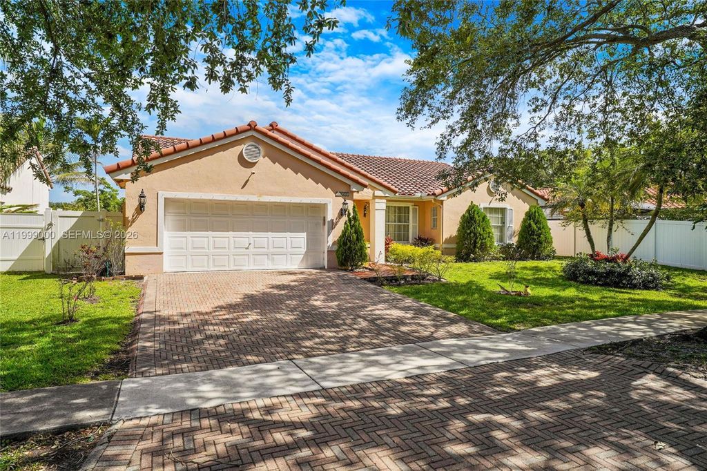 Photo of 12611 SW 20th St, Miramar, FL 33027 (MLS # A11999000)