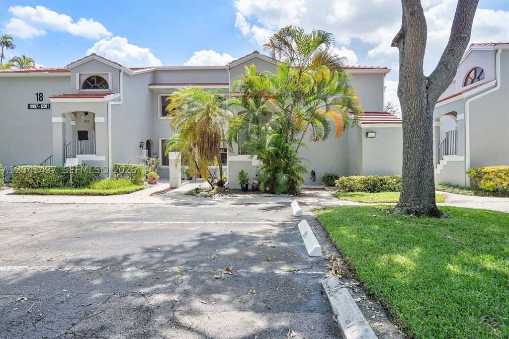 Photo of 12003 NW 11th St #12003, Pembroke Pines, FL 33026 (MLS # A12041407)