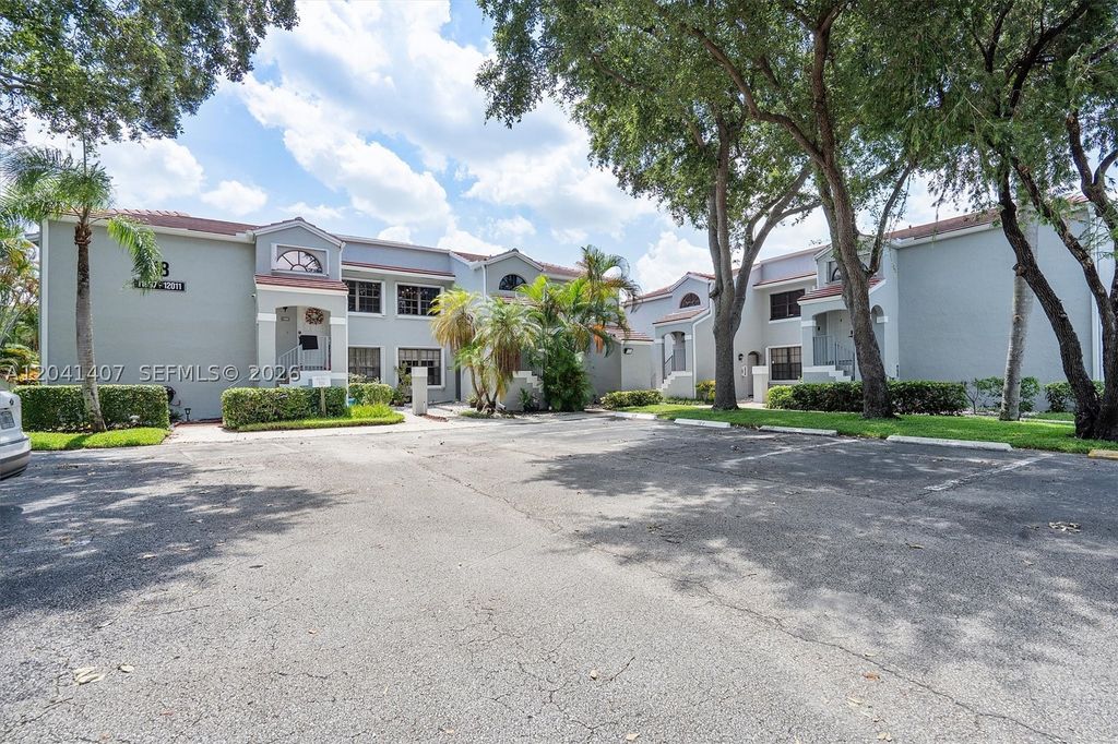Photo of 12003 NW 11th St #12003, Pembroke Pines, FL 33026 (MLS # A12041407)