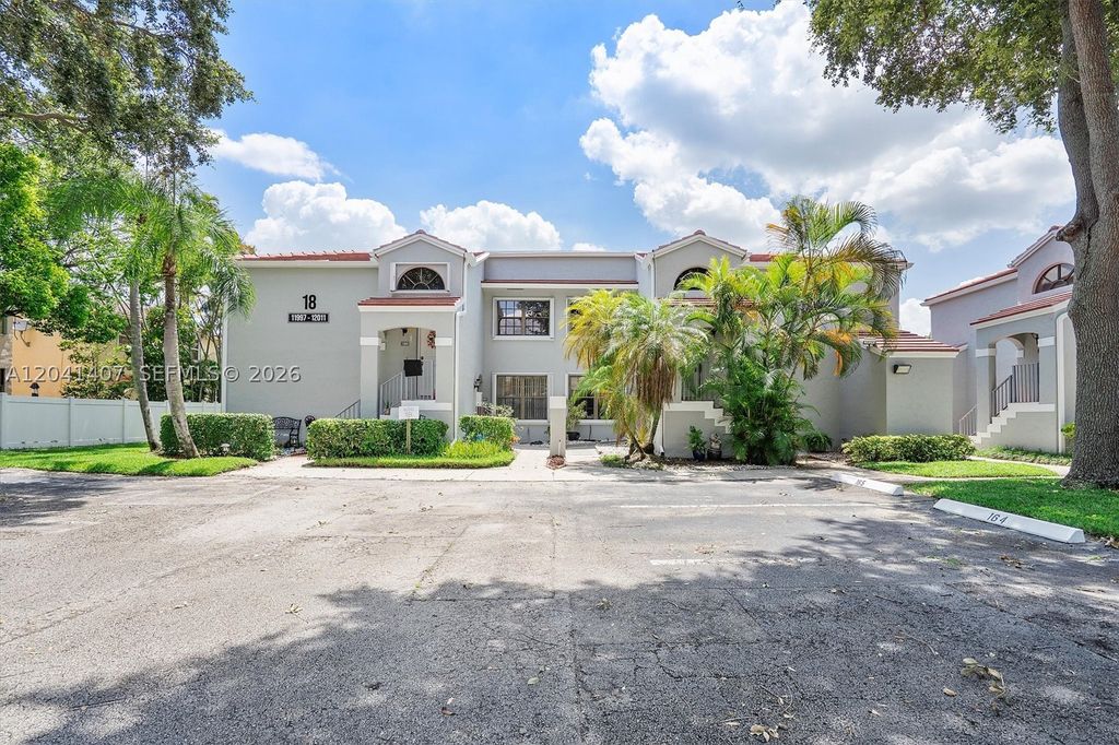 Photo of 12003 NW 11th St #12003, Pembroke Pines, FL 33026 (MLS # A12041407)