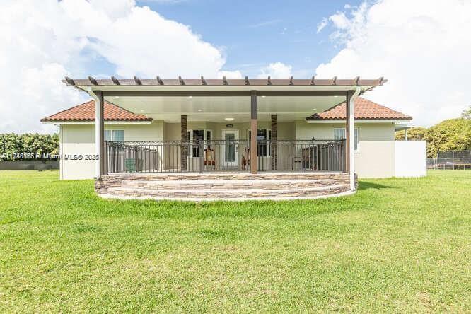 Family compound for rent on almost 5 acres! Beautiful main house with 4 bedrooms, each with a private full bath, walk-in closet + a 2 bed/1 ba guest house and a 1 bed/1 ba efficiency. Rent with furniture or without. kitchen has quartz counters, SS appliances & wood cabinets, Rent for 1 year or ask for shorter or longer rental term, up to 5 year lease available. Property is fully fenced w/outdoor lighting + automatic gates & contains a Guava grove on the rear half of the property that is being maintained by the Owner. There's a large front porch for relaxing & enjoying the outdoors, or lay around on the patio overlooking the pool and whirlpool! Plenty of room for all your toys and pets you can rent the whole property for $10,000 per month & Landlord will remove the Guava Grove.