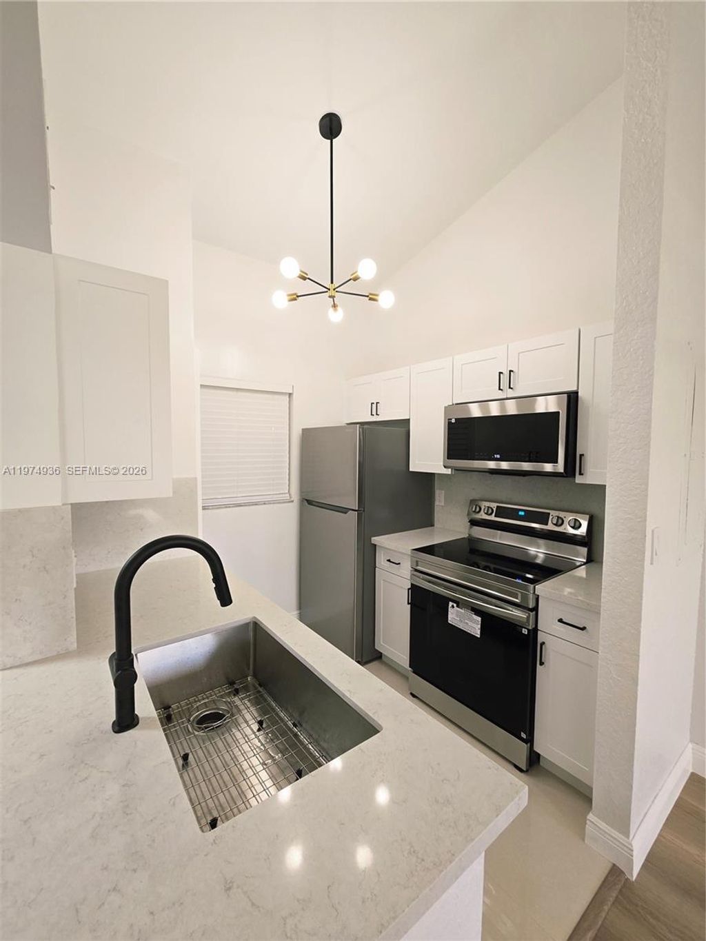 Photo of 2881 N Oakland Forest Dr #310, Oakland Park, FL 33309 (MLS # A11974936)