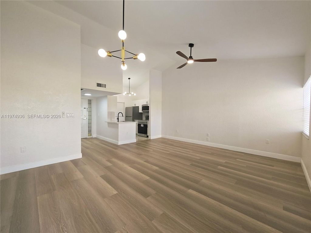 Photo of 2881 N Oakland Forest Dr #310, Oakland Park, FL 33309 (MLS # A11974936)