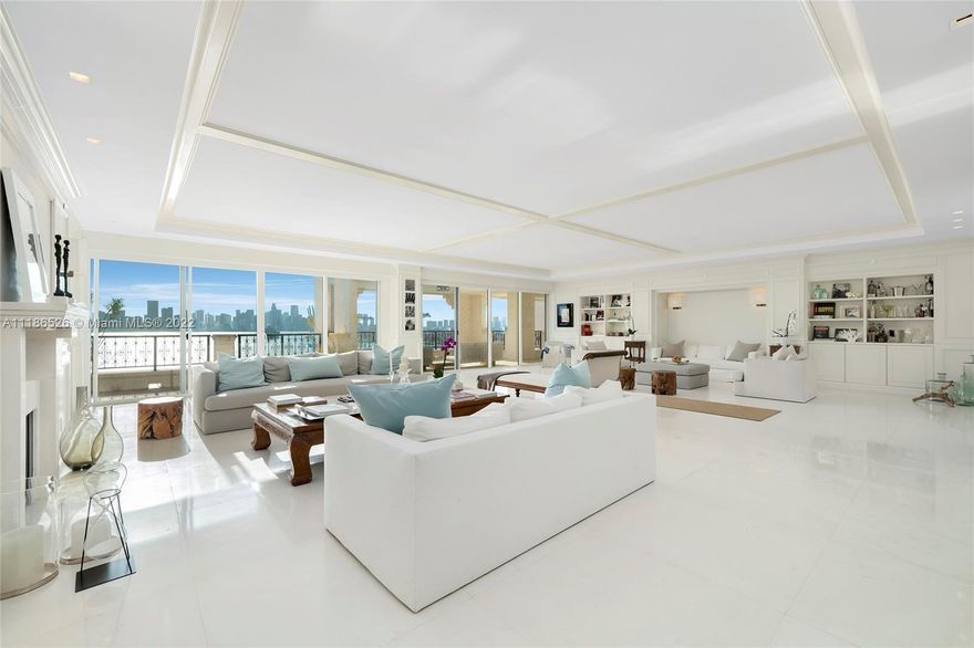 This impeccable Bayview lower penthouse is a truly a masterpiece. Enjoy +/-2,000 SF of flowing wrap-around terraces with amazing unobstructed views over Biscayne Bay and the Miami skyline plus views over Fisher Island to the ocean & Government Cut. The unit boasts +/-6,500 interior SF of luxury with exquisite limestone floors, expansive living room with a fireplace, a formal dining room, custom millwork & designer finishes throughout. A Beux Art gourmet kitchen sports top-of-the-line Wolf, Miele, & Sub-Zero appliances and opens to a large family room. The sumptuous principal suite has a fireplace, step-out balcony access, direct bay & downtown views, spectacular dual principal baths with amazing water views & custom dual walk-in closets. Residents will enjoy Fisher Island 5-star amenities.