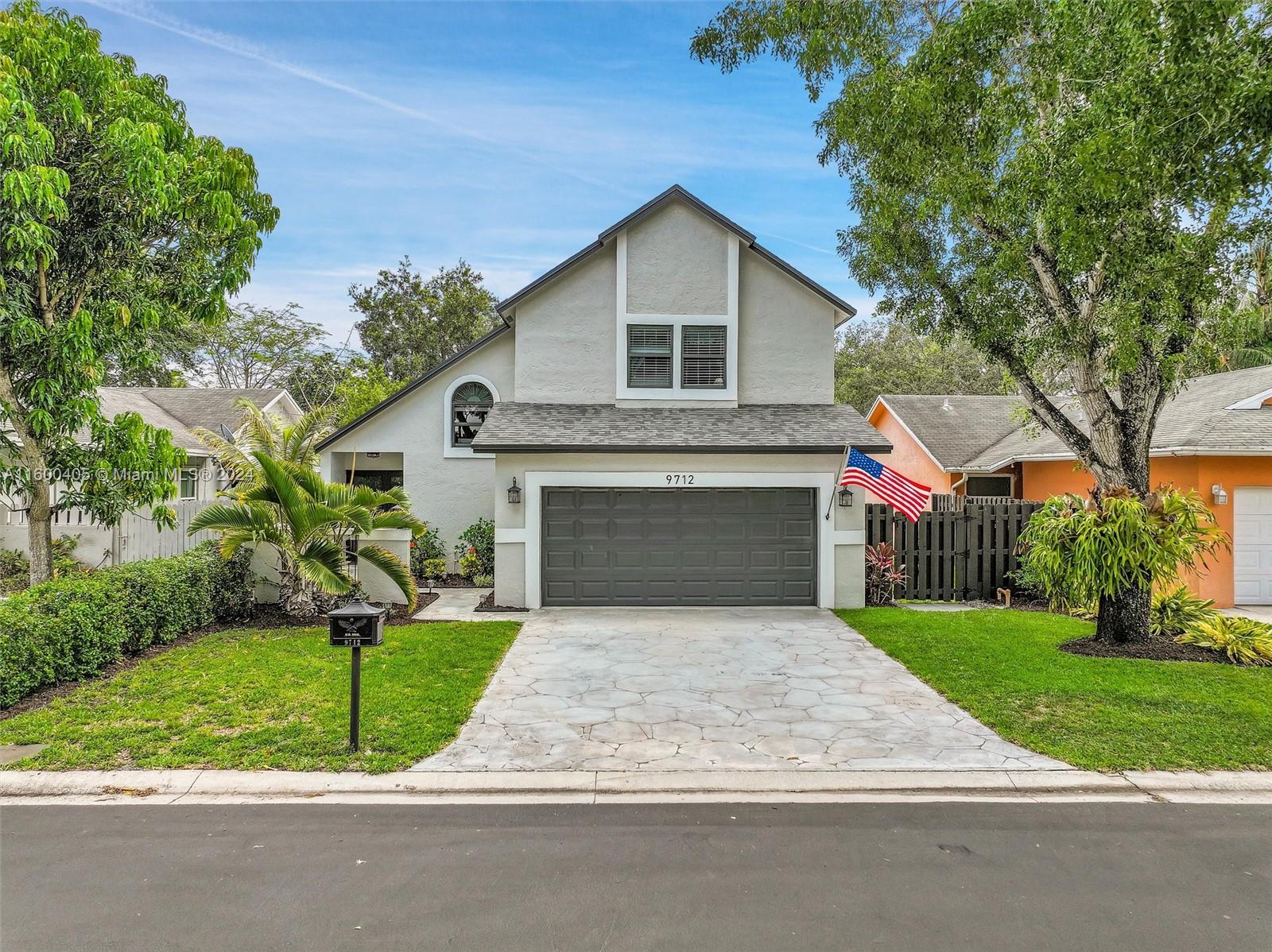 Make this beautiful 3 bedroom and 2.5 bathroom two story house your home! Nestled in Cooper City which has been highly coveted for its safety and A rated Schools. Vaulted ceilings really showcases the space. The view of the lake from the master bedroom is splendid. This home has been renovated throughout from the floors to the roof. Hurricane impact windows and doors throughout, including the garage door. The roof is from 2022, A/C 2018, and water heater 2016. Access to major highways are minutes away and give ease of access to the many beautiful beaches and parks that Florida has to offer, from Miami to Fort Lauderdale and beyond. No HOA approval required. Bonus: Den can be converted to a fourth bedroom.