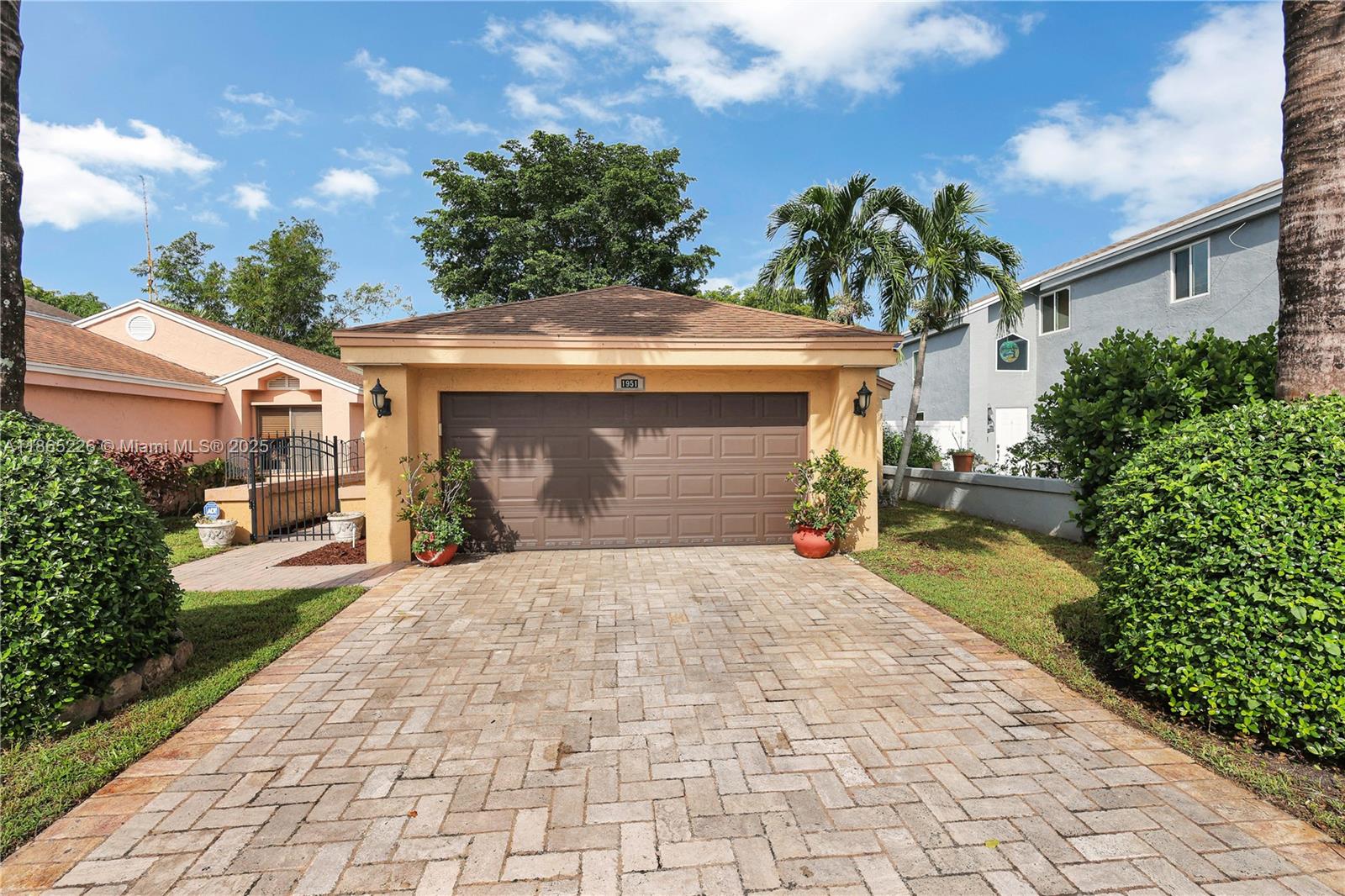 Impeccably updated 3-bedroom, 2-bath home in Coconut Creek featuring a bright open layout with high ceilings, skylight in the dining area, and durable LVP flooring. The spacious kitchen showcases granite countertops and modern cabinetry, while the primary suite offers vaulted ceilings for an airy retreat. Outdoor living includes a screened patio, fenced yard with synthetic grass, and a BBQ entry. Community amenities feature a pool, tennis, gym, clubhouse, guard gate, internet, and basic cable—all for just $279/mo HOA. Conveniently located only 20 minutes from the beach and home to Randazzo private school (Kinder–High School) within the community. Equipped with metal shutters; windows are not hurricane proof. Move-in ready and ideal for today’s lifestyle.