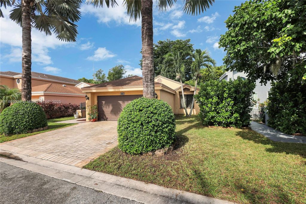 Photo of 1951 NW 35th Ter, Coconut Creek, FL 33066 (MLS # A11865226)