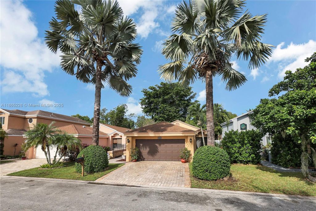 Photo of 1951 NW 35th Ter, Coconut Creek, FL 33066 (MLS # A11865226)