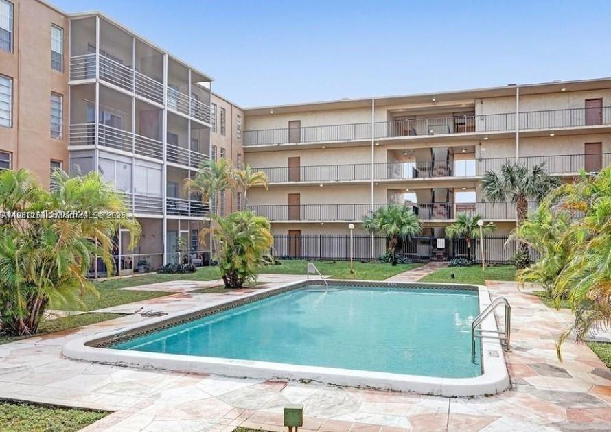THIS LARGE 850 SQ 1/1 CONDO IN THE GATED COMMUNITY OF TOWN SQUARE IS A MUST-SEE! THIS UNIT FEATURES A SPACIOUS FLOOR PLAN WITH TILE FLOORS THROUGHOUT. A/C REPLACED IN EARLY 2020! GATED COMMUNITY WITH SECURED ENTRANCE. CLUBHOUSE, COMMUNITY POOL AND LAUNDRY ROOM ON EACH FLOOR. UNIT ALSO OFFERS PLENTY OF STORAGE SPACE AND A LARGE WALK-IN CLOSET PLUS AN ENCLOSED SCREENED PATIO FOR THOSE BEAUTIFUL EVENINGS OF TROPICAL SUNSETS WITH NATURAL SCENERY OF THE BROWARD HABITAT CONNECTIVITY PROJECT PARK. WATER/TRASH.