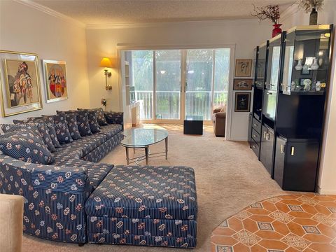 Photo of 3850 Washington St #214, Hollywood, FL 33021 (MLS # A11984940)