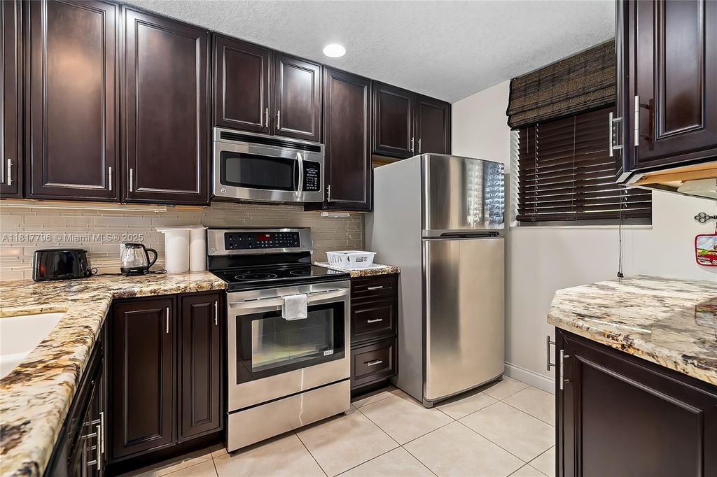 Photo of 4345 Trevi Ct #202, Lake Worth, FL 33467 (MLS # A11817796)