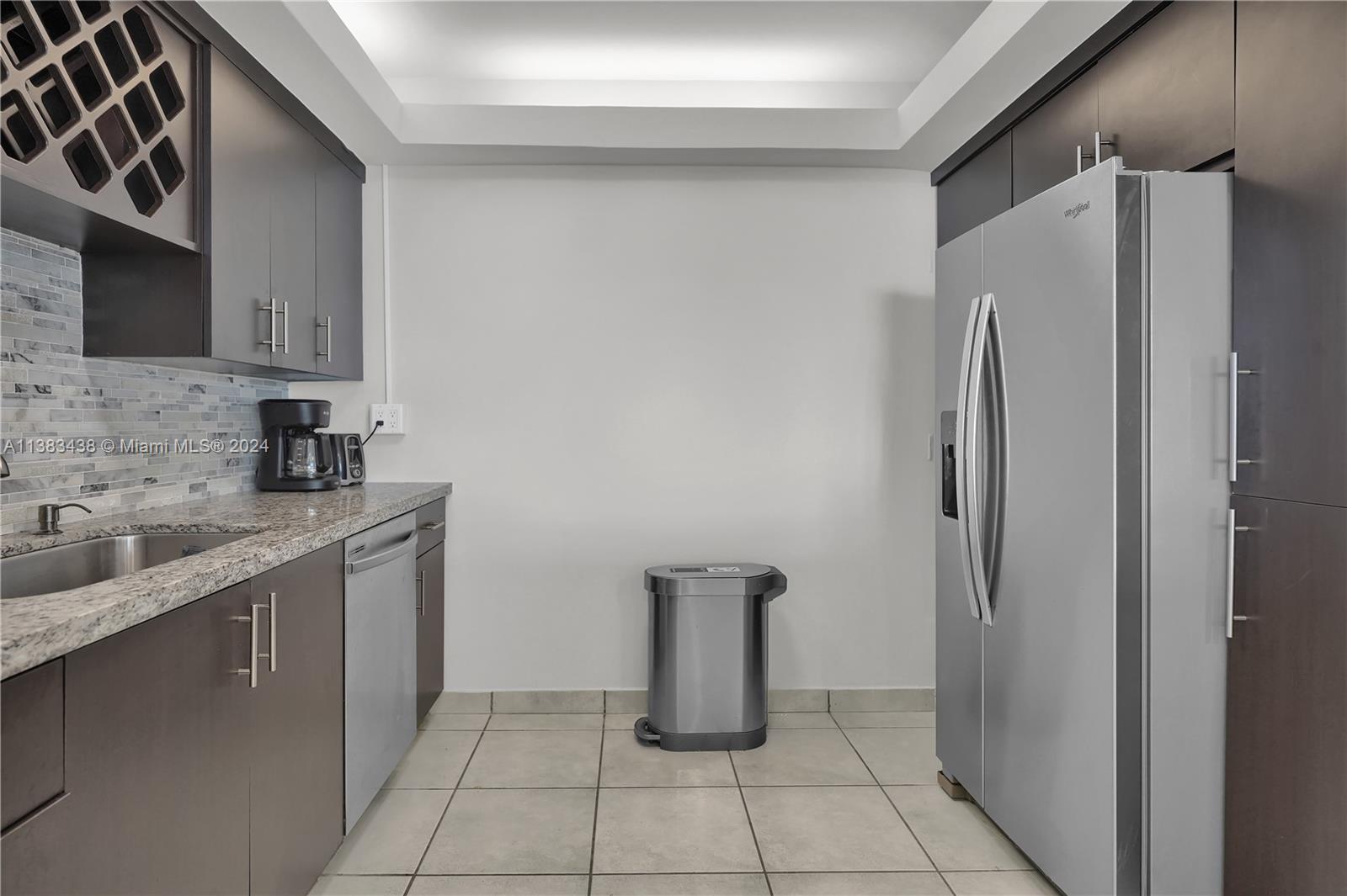 THE CARRIAGE HOUSE CONDO - Residential