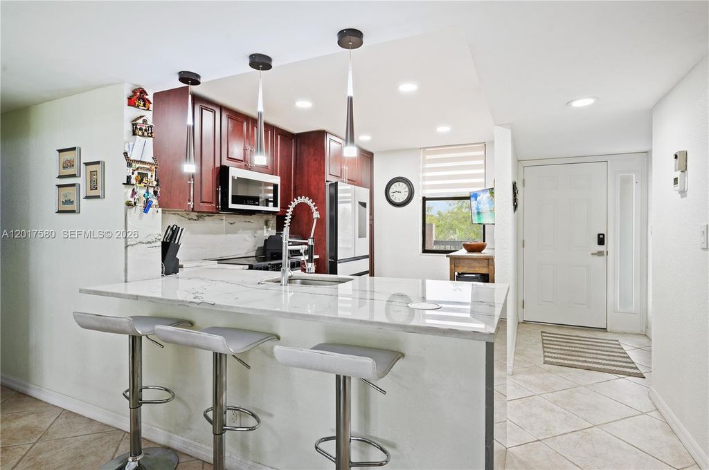 Photo of 2768 S Carambola Cir S #403, Coconut Creek, FL 33066 (MLS # A12017580)