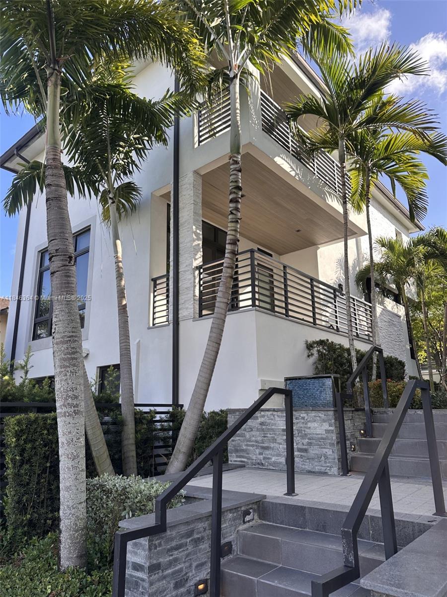 Discover stunning luxury living in this exquisite four-bedroom, 3.5-bathroom home for rent in the heart of Downtown Doral. This former model residence boasts high-end finishes and a modern architectural design that seamlessly blends style and functionality. The open-concept layout creates a spacious atmosphere ideal for both relaxation and entertaining, highlighted by an elegant kitchen equipped with premium appliances. With immediate availability, this home is ideally situated near top-rated schools, vibrant dining options, and bustling shopping and entertainment centers. Seize the opportunity to reside in one of Miami's most desirable communities and elevate your lifestyle today!