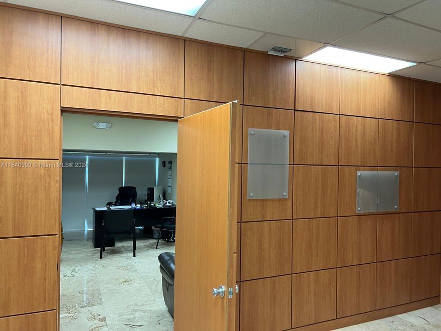 This industrial warehouse unit is located in the thriving Palmetto West Park Condo, offering a prime opportunity for businesses seeking a versatile and spacious property in Doral, Florida. Conveniently situated in an industrial zone, this property is ideal for heavy manufacturing or storage operations. It offers a total area of 7,103 square feet, providing flexible space for various business operations. The property is strategically positioned with convenient access to major highways and transportation hubs, enhancing logistics and supply chain efficiency.