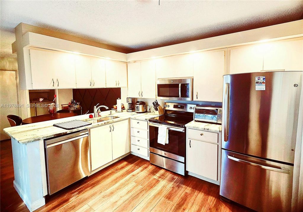 Photo of 1931 Hartford Ct #21C, West Palm Beach, FL 33409 (MLS # A11978891)