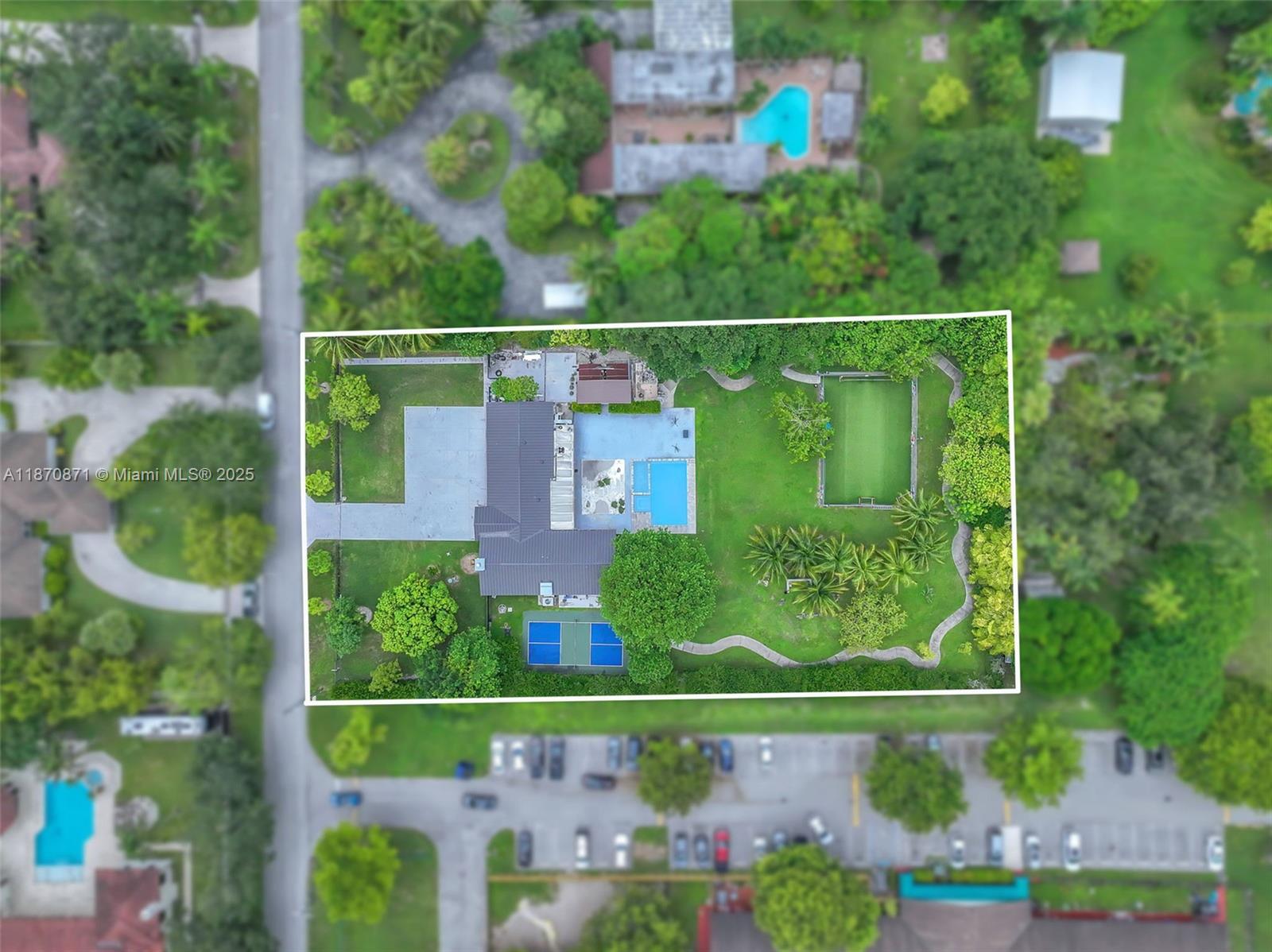 FEATURING 50,529 SF OF LOT IN THE HEART OF CALUSA CLUB 1 ACRE ESTATES!!
Totaling over 2,800 SF, this fully remodeled 1-story home boasts 5 Bedrooms & 5 full Bathrooms.
The backyard is a true retreat, featuring full outdoor Kitchen, step outside and take in the serene view of the private swimming pool with adjacent spa, Pickle ball court, soccer field, & fire pit. Perfect for guests or large family.
Lot offers a rare opportunity to build or renovate an exceptional estate.